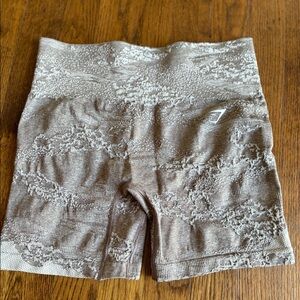 Gymshark tan camo shorts.